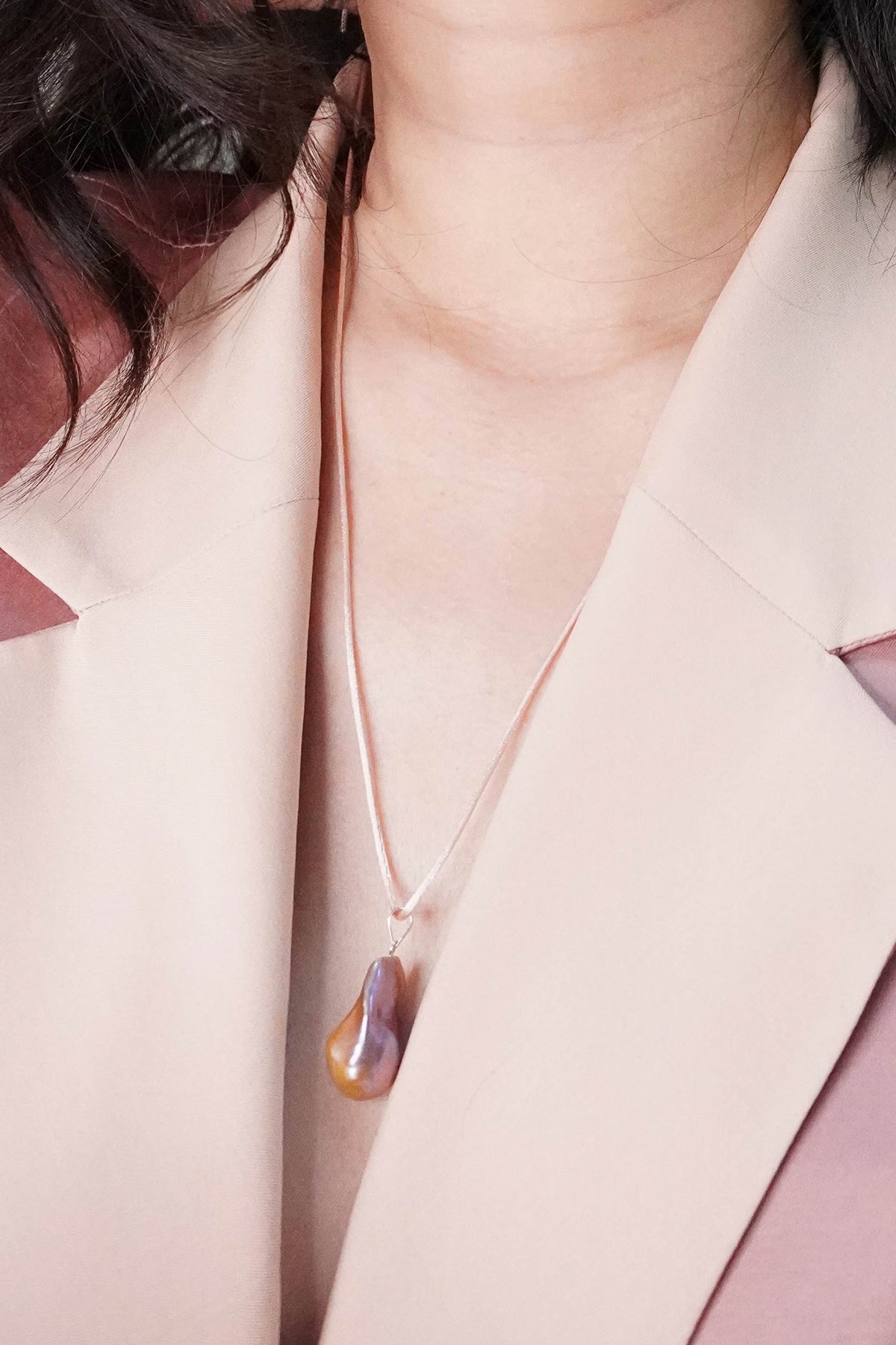 Consus  Sunset baroque pearl necklace on a brown cord