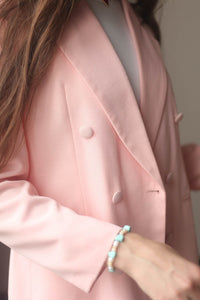 Pink suit