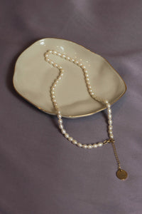 Rice pearl strand necklace