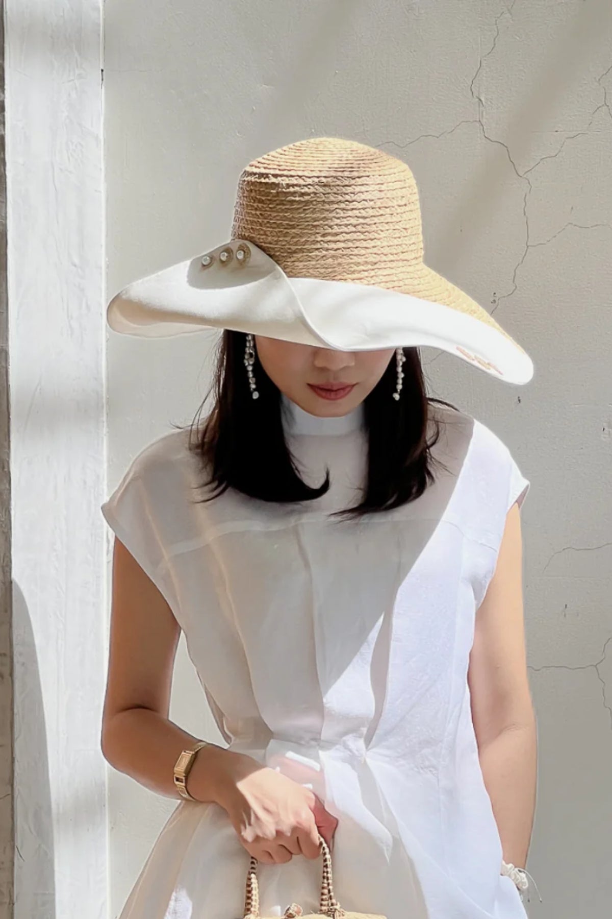 Chapeau à bord large Romy de raphia naturel et toile blanche