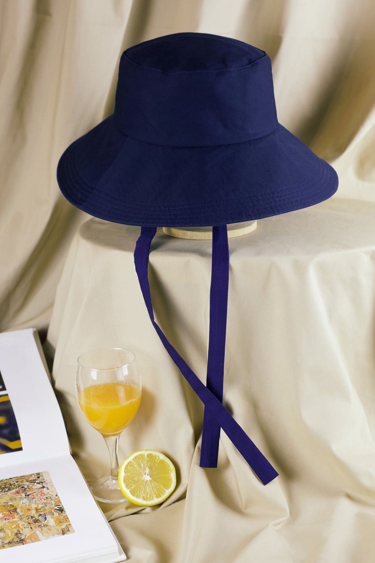 Chapeau Lu en tissu à bord volant