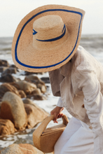 Load image into Gallery viewer, Cosmica raffia straw hat with flat crown and hand-sewn épuré fabric curves