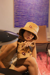 Bucket hat made from eco fur with colorful leopard pieces