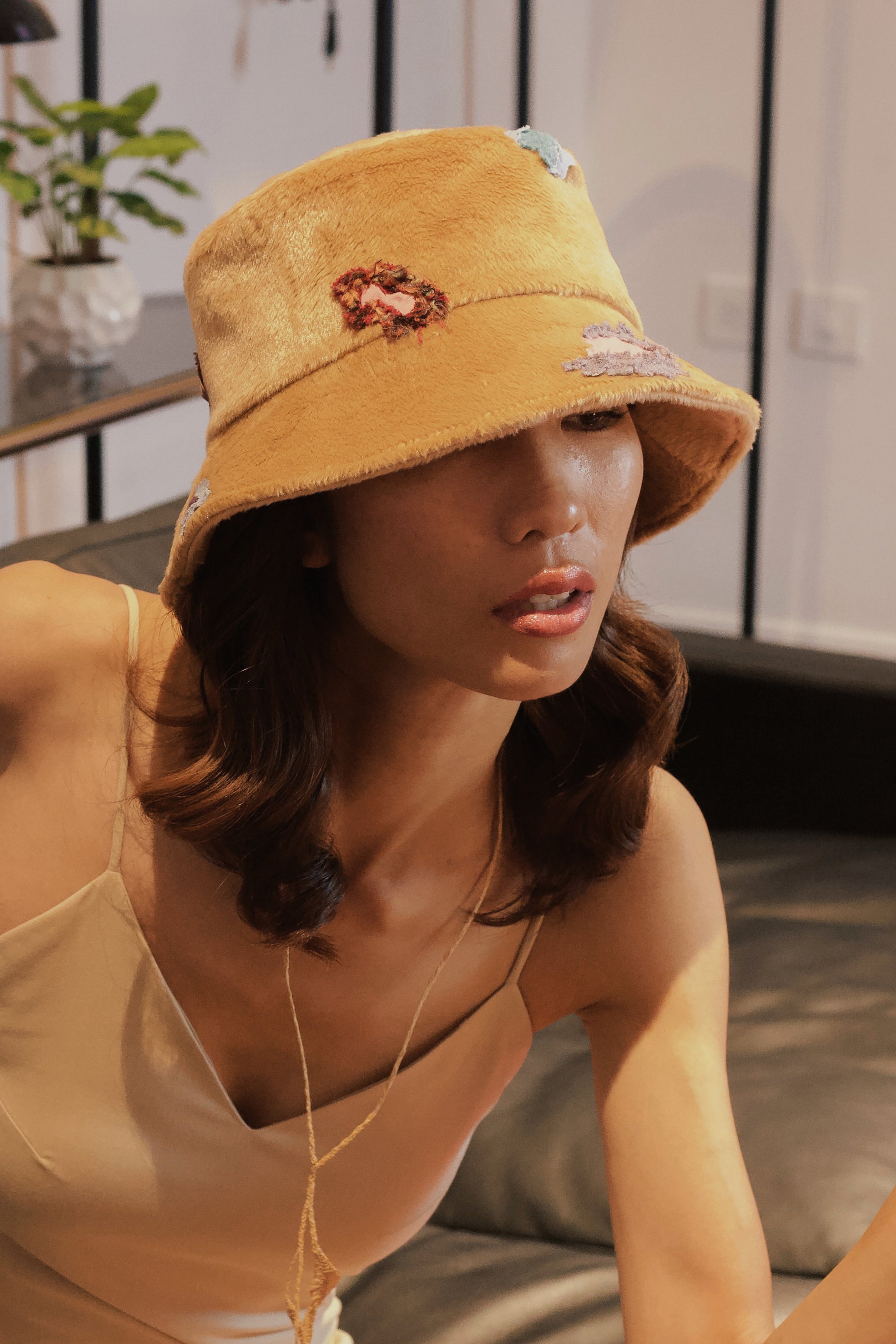 Bucket hat made from eco fur with colorful leopard pieces