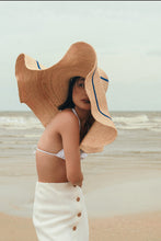 Load image into Gallery viewer, Wide brim raffia hat with curved brim from Formscape